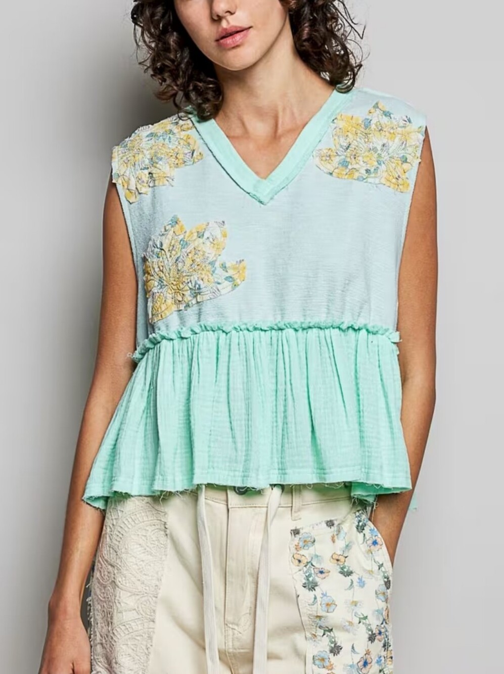 322. POL Sleeveless Mint Floral Peplum Top